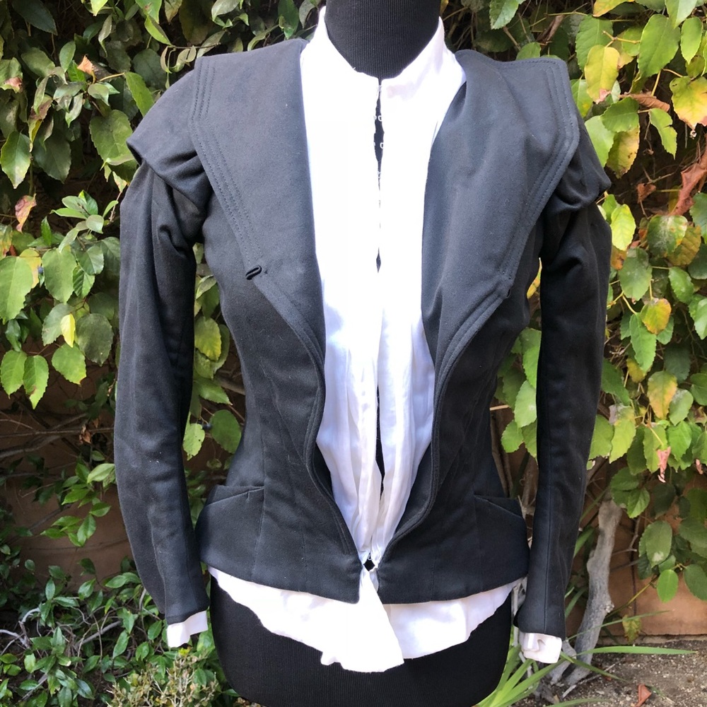 Gorgeous jacket with white silk detail.